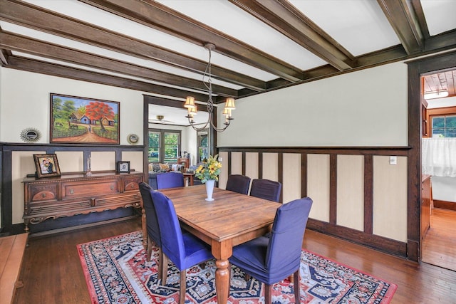310 Davidson Dr, Champaign, IL 61821 - dining area with beamed ceiling, a chandelier, healthy amount of natural light, and wood finished floors