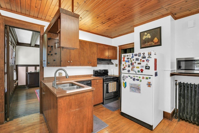 310 Davidson Dr, Champaign, IL 61821 - kitchen with appliances with stainless steel finishes, under cabinet range hood, wooden ceiling, light wood-type flooring, and brown cabinetry