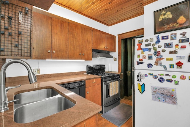 310 Davidson Dr, Champaign, IL 61821 - kitchen with freestanding refrigerator, stainless steel range with gas stovetop, dishwasher, under cabinet range hood, and wooden ceiling