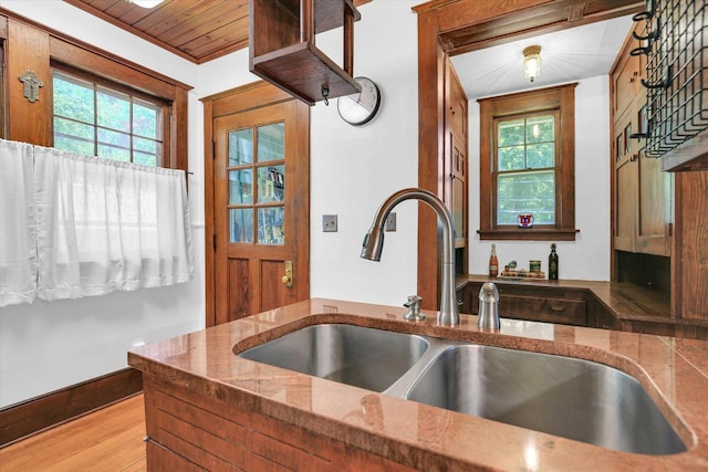310 Davidson Dr, Champaign, IL 61821 - kitchen featuring healthy amount of natural light, wood finished floors, stone counters, and wood ceiling