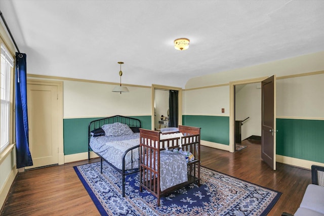 310 Davidson Dr, Champaign, IL 61821 - bedroom with wood finished floors and baseboards