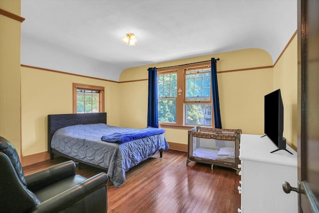 310 Davidson Dr, Champaign, IL 61821 - bedroom featuring wood finished floors and lofted ceiling