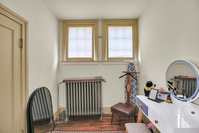 310 Davidson Dr, Champaign, IL 61821 - sitting room with radiator, healthy amount of natural light, and wood finished floors