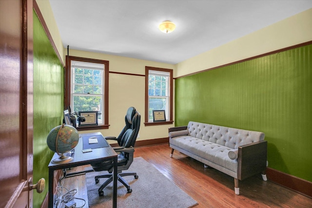 310 Davidson Dr, Champaign, IL 61821 - home office with healthy amount of natural light and wood finished floors