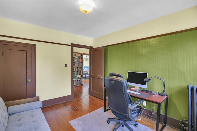 310 Davidson Dr, Champaign, IL 61821 - home office with baseboards and wood finished floors