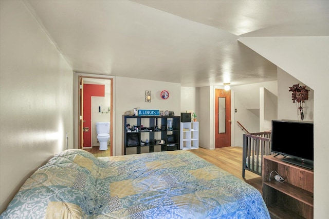 310 Davidson Dr, Champaign, IL 61821 - bedroom featuring wood finished floors and ensuite bath