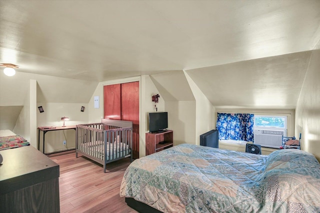 310 Davidson Dr, Champaign, IL 61821 - bedroom with vaulted ceiling and wood finished floors