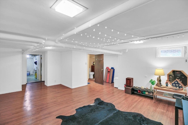 310 Davidson Dr, Champaign, IL 61821 - basement with wood finished floors and baseboards