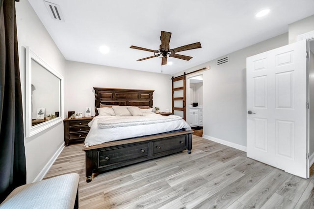 15704 Orlan Brook Dr Unit 163, Orland Park, IL 60462 - bedroom featuring a barn door, light wood-type flooring, baseboards, recessed lighting, and ceiling fan