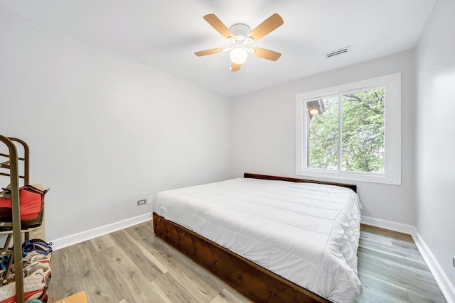 15704 Orlan Brook Dr Unit 163, Orland Park, IL 60462 - bedroom featuring light wood-style flooring, baseboards, and a ceiling fan