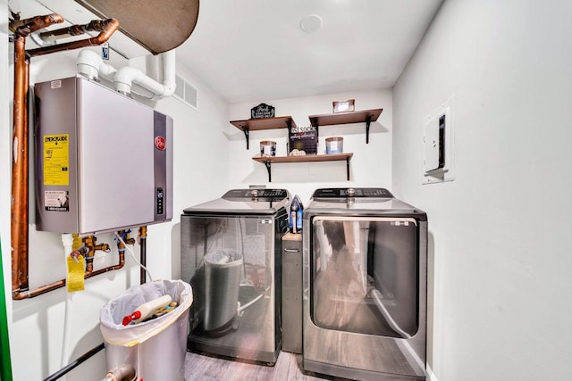 15704 Orlan Brook Dr Unit 163, Orland Park, IL 60462 - washroom with washing machine and clothes dryer, tankless water heater, and wood finished floors