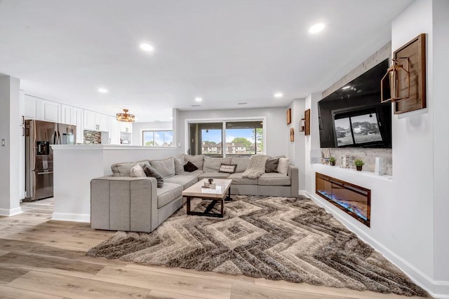 15704 Orlan Brook Dr Unit 163, Orland Park, IL 60462 - living room featuring light wood finished floors, recessed lighting, and baseboards