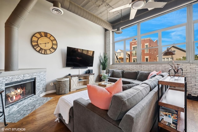 2750 N Wayne Ave Unit G, Chicago, IL 60614 - living area featuring ceiling fan, wood finished floors, a tile fireplace, and baseboards