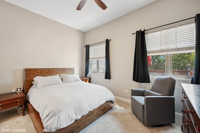 2750 N Wayne Ave Unit G, Chicago, IL 60614 - bedroom with light carpet, multiple windows, baseboards, and ceiling fan