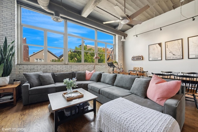 2750 N Wayne Ave Unit G, Chicago, IL 60614 - living room with brick wall, ceiling fan, wood finished floors, a high ceiling, and wood ceiling with exposed beams