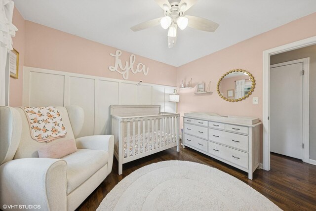 710 Western Ave, Glen Ellyn, IL 60137 - bedroom with dark wood finished floors, a nursery area, a ceiling fan, and baseboards