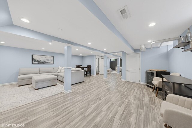 710 Western Ave, Glen Ellyn, IL 60137 - living room with recessed lighting, light wood-style floors, baseboards, and beverage cooler