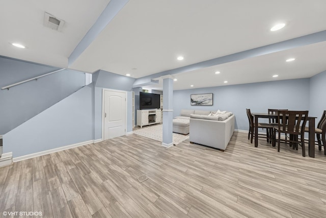 710 Western Ave, Glen Ellyn, IL 60137 - living room with light wood-style floors, recessed lighting, and baseboards