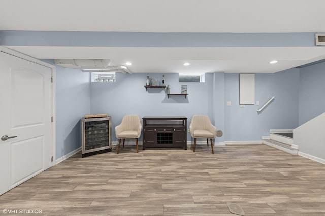 710 Western Ave, Glen Ellyn, IL 60137 - sitting room with wine cooler, wood finished floors, baseboards, a dry bar, and recessed lighting