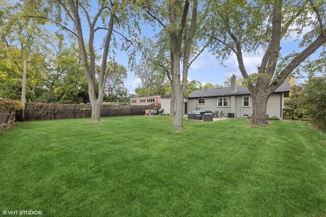 710 Western Ave, Glen Ellyn, IL 60137 - view of yard featuring an outdoor living space and a patio area