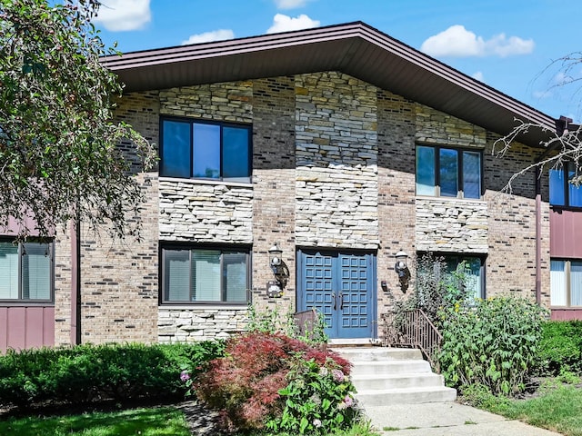 1640 Royal Oak Rd Unit 4, Darien, IL 60561 - view of front of property with stone siding and brick siding