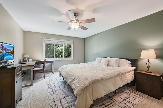 1640 Royal Oak Rd Unit 4, Darien, IL 60561 - bedroom with light carpet, a desk, and a ceiling fan