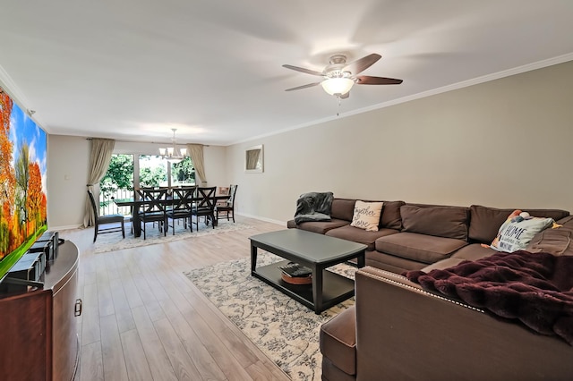 1640 Royal Oak Rd Unit 4, Darien, IL 60561 - living room with a chandelier, crown molding, ceiling fan, wood finished floors, and baseboards