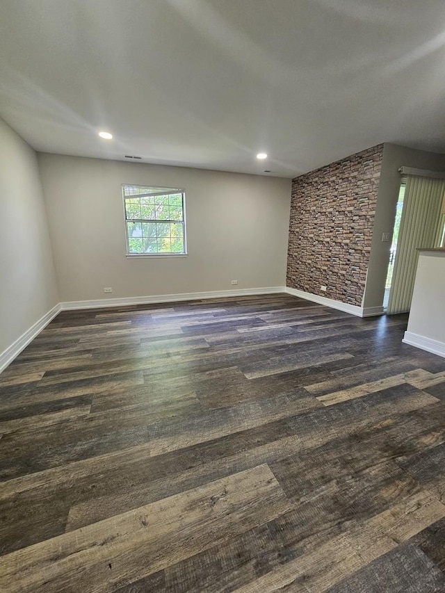 78 N Victoria Ln Unit F, Streamwood, IL 60107 - unfurnished living room featuring dark wood-style floors, recessed lighting, and baseboards