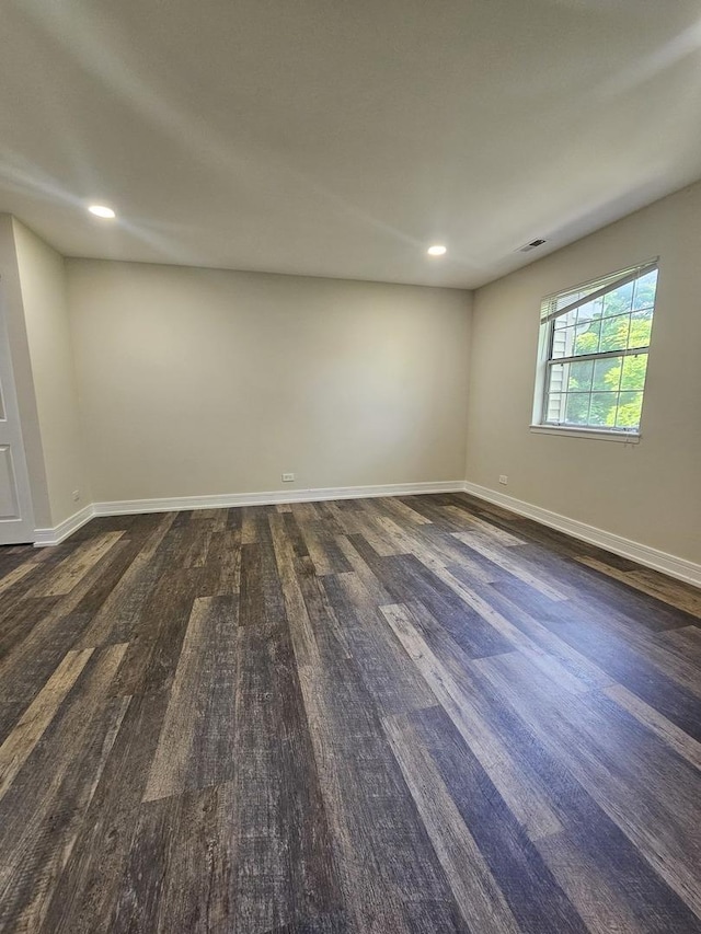 78 N Victoria Ln Unit F, Streamwood, IL 60107 - spare room featuring dark wood finished floors, baseboards, and recessed lighting