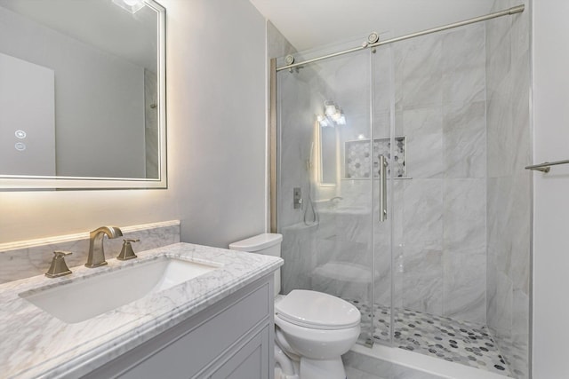 1115 S Plymouth Ct Unit 102, Chicago, IL 60605 - full bathroom featuring toilet, a shower stall, and vanity