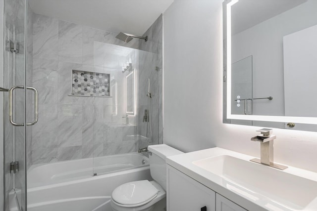 1115 S Plymouth Ct Unit 102, Chicago, IL 60605 - bathroom featuring toilet, vanity, and shower / bath combination with glass door