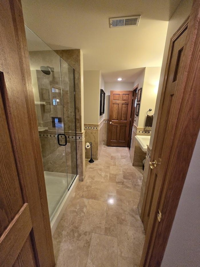 10880 Swallow Tail Ln, Frankfort, IL 60423 - bathroom with a shower stall and wainscoting