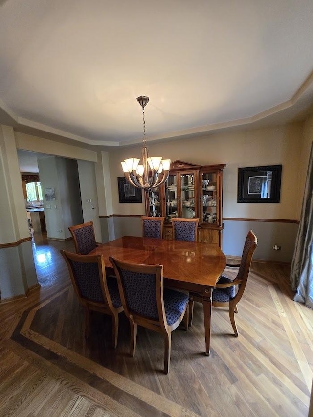 10880 Swallow Tail Ln, Frankfort, IL 60423 - dining area featuring a chandelier and light wood finished floors