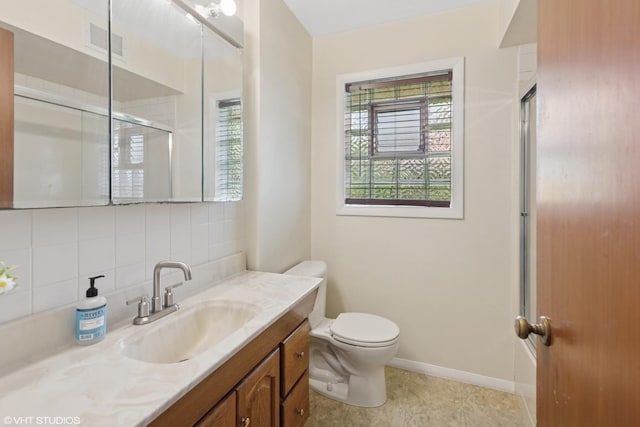 4N312 Kenwood Ave, West Chicago, IL 60185 - bathroom featuring vanity, tasteful backsplash, toilet, and baseboards