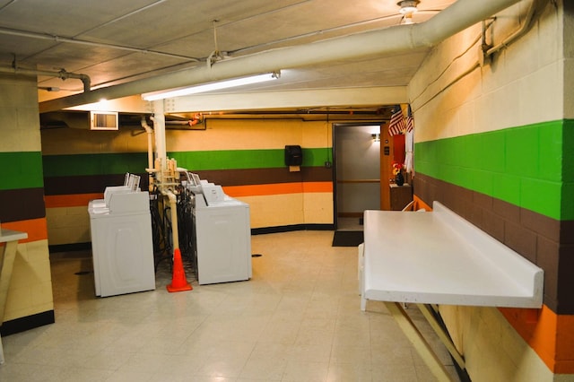 9820 S Pulaski Ave Unit 218, Oak Lawn, IL 60453 - finished basement with separate washer and dryer, concrete block wall, and tile patterned floors