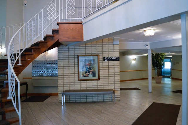 9820 S Pulaski Ave Unit 218, Oak Lawn, IL 60453 - stairs featuring baseboards