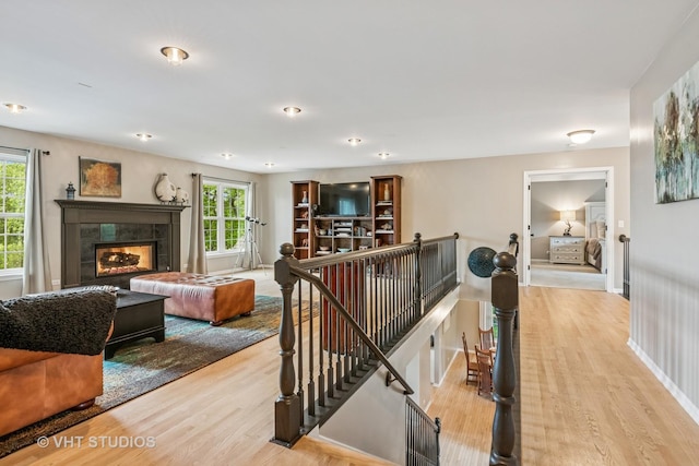 900 Legacy Rdg, Algonquin, IL 60102 - living room featuring light wood-style floors and a tile fireplace