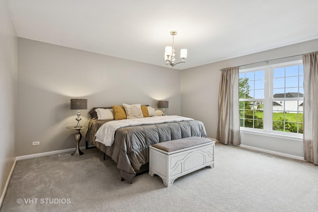 900 Legacy Rdg, Algonquin, IL 60102 - bedroom featuring a chandelier and light colored carpet
