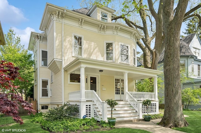 739 Forest Ave, Evanston, IL 60202 - italianate house with covered porch and stairway