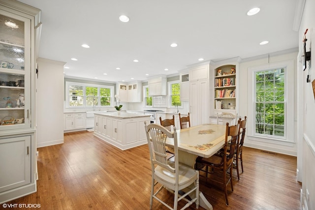 739 Forest Ave, Evanston, IL 60202 - dining area featuring crown molding, light wood-type flooring, and recessed lighting