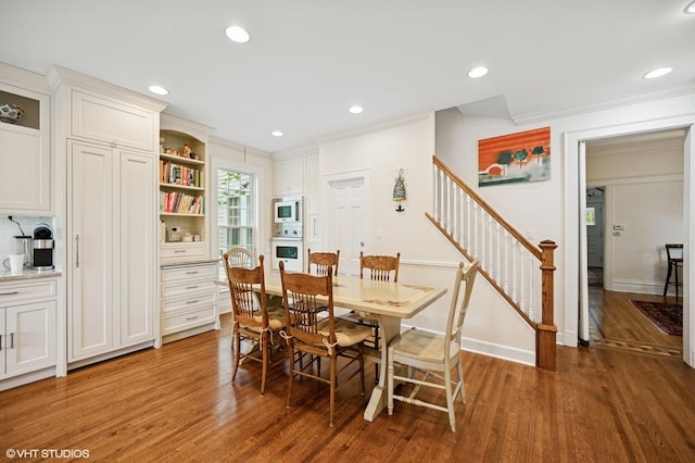 739 Forest Ave, Evanston, IL 60202 - dining room with stairs, light wood-style floors, recessed lighting, ornamental molding, and baseboards
