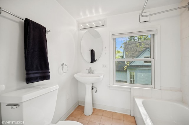 739 Forest Ave, Evanston, IL 60202 - full bath with toilet, a bath, tile patterned floors, baseboards, and a sink