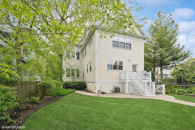 739 Forest Ave, Evanston, IL 60202 - back of house featuring a patio area, stairway, and central AC unit