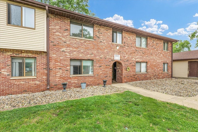 1803 Oliver Dr Unit 3, Urbana, IL 61802 - townhome / multi-family property with a front yard and brick siding
