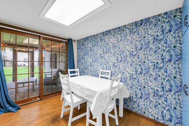 1803 Oliver Dr Unit 3, Urbana, IL 61802 - dining room featuring wallpapered walls and light wood finished floors