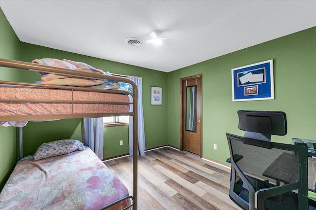 1803 Oliver Dr Unit 3, Urbana, IL 61802 - bedroom with light wood finished floors and baseboards