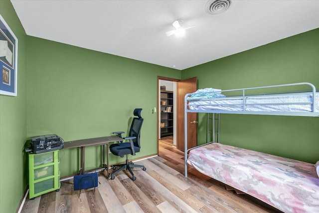 1803 Oliver Dr Unit 3, Urbana, IL 61802 - bedroom with wood finished floors, a desk, and baseboards