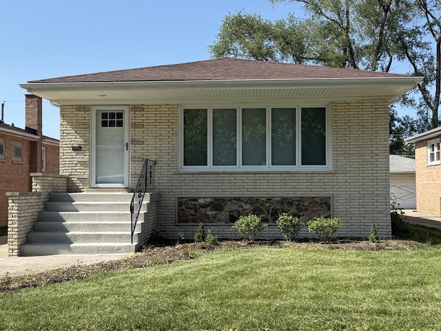 3906 W 117th St, Alsip, IL 60803 - view of front of home with a front yard and brick siding