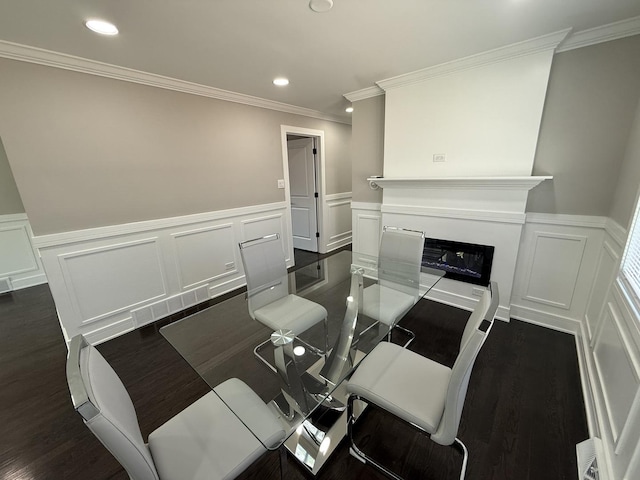 3906 W 117th St, Alsip, IL 60803 - dining space featuring wainscoting, a decorative wall, dark wood finished floors, ornamental molding, and a fireplace