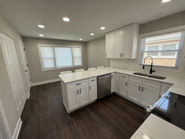 3906 W 117th St, Alsip, IL 60803 - kitchen with dishwasher, dark wood finished floors, a peninsula, white cabinets, and recessed lighting